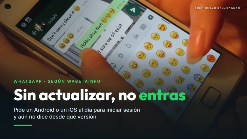Manos que escriben con emojis en WhatsApp en un móvil antiguo, junto al texto: WhatsApp, según WABetaInfo. Sin actualizar, no entras. Pide un Android o un iOS al día para iniciar sesión